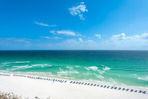 On the beach, sun-loungers