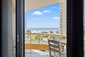 A balcony with a view of the beach and ocean. - Perfect Ocean View! Large Balcony-Fantastic Kitchen & Baths! + Beach Locker! (Myrtle Beach)