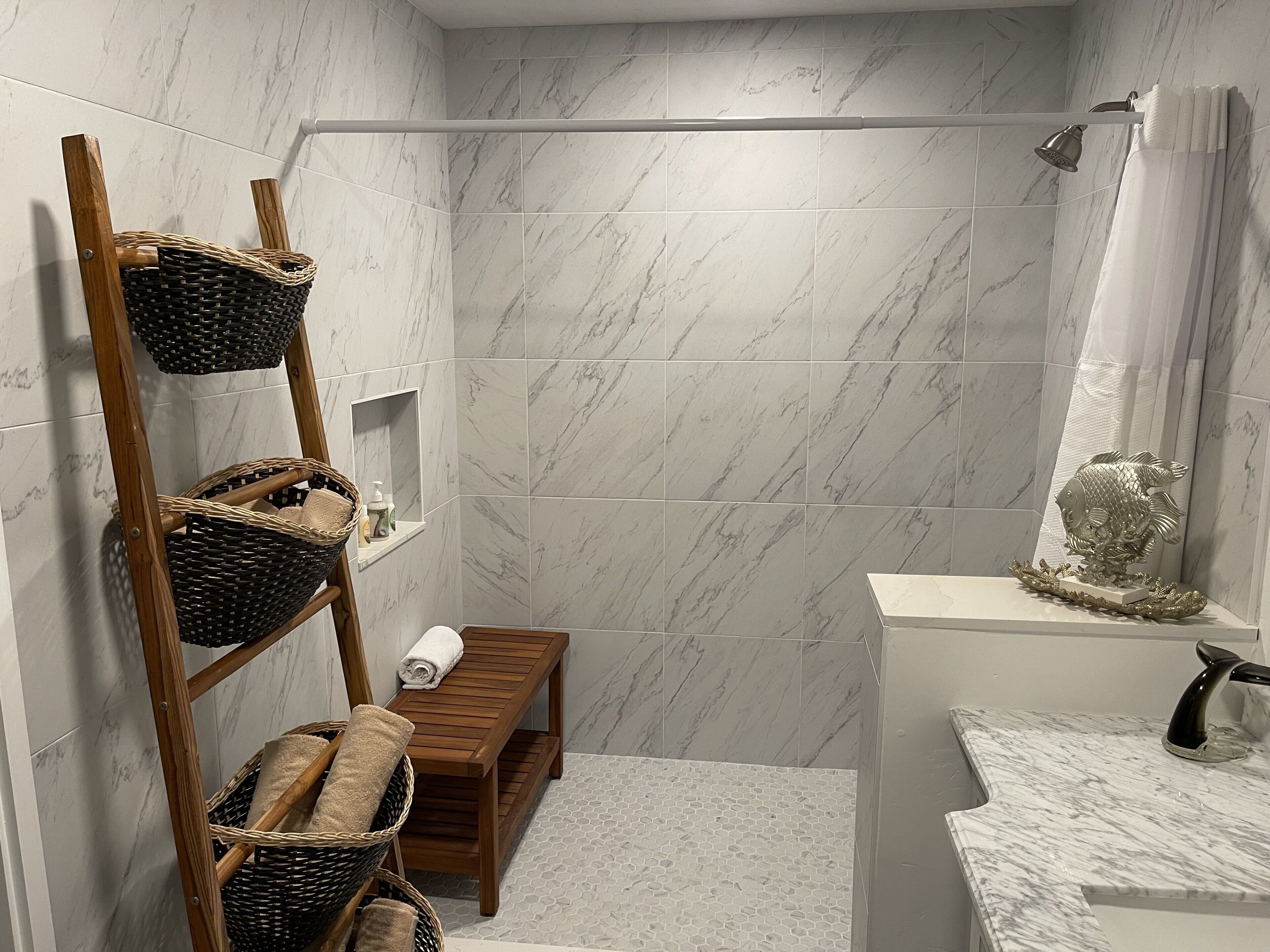 Combined shower/tub, hair dryer, towels, soap