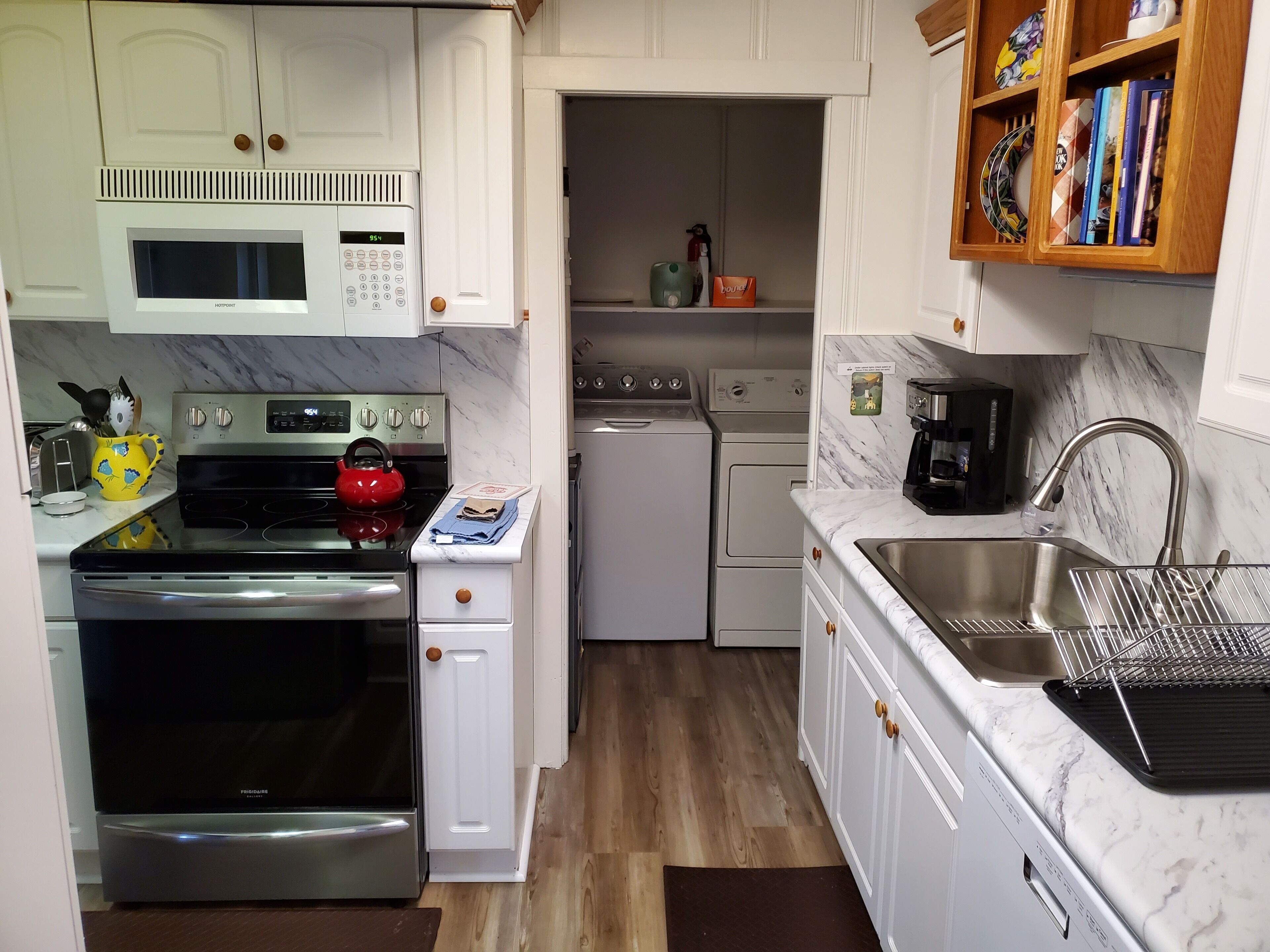 Coffee/tea maker, fridge, microwave, oven