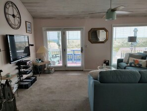Smart TV, fireplace, DVD player, books