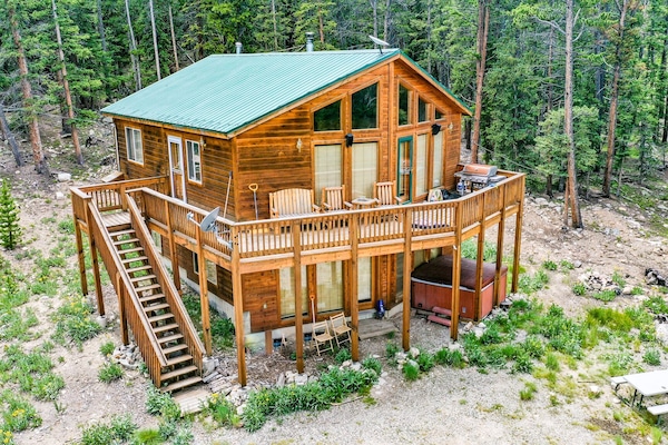 The cozy cabin gives you plenty of space to enjoy the outdoors - including your own hot tub!