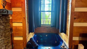 Combined shower/bathtub, hair dryer, towels, soap