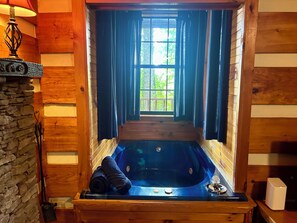 Combined shower/tub, hair dryer, towels, soap