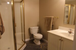 Shower, towels, soap, toilet paper - Riverside Condo. Perfect for your next adventure. (Fernie)