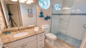 Combined shower/bathtub, hair dryer, towels, soap - Sunset Landing AMI Beach House. 6BR/4.5BA. Private pool. 2 blks to beach. (Holmes Beach)