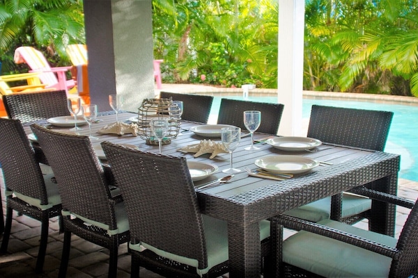 Eat your grilled catch of the day poolside in our new outdoor dining set for 8.