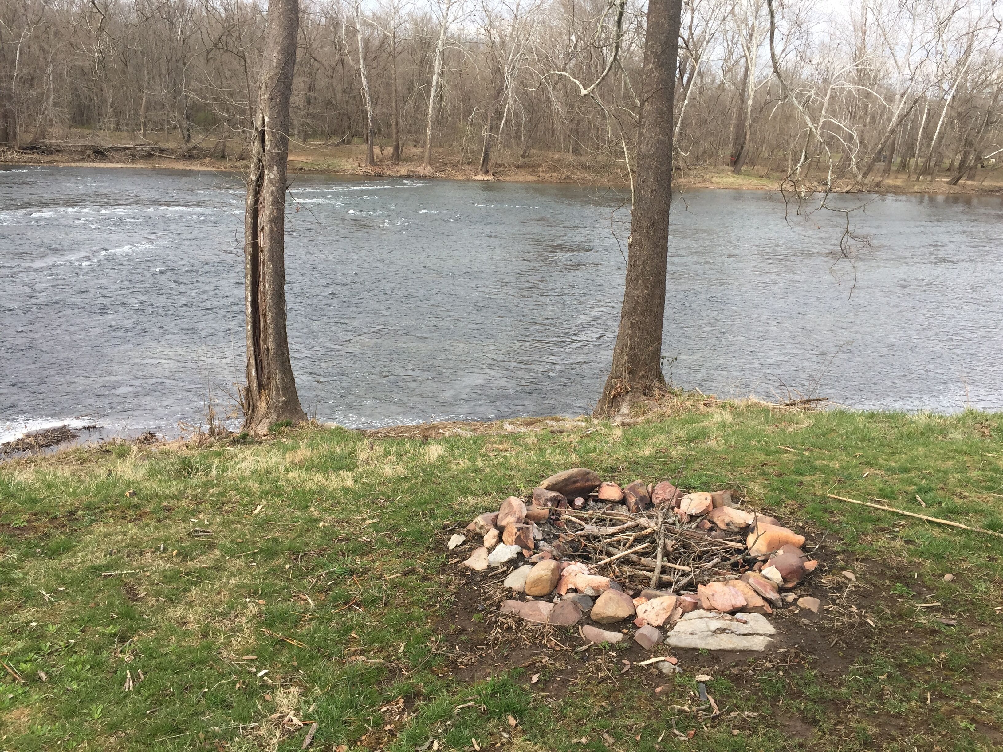 Enjoy a campfire at the river's edge