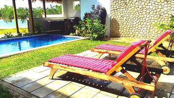 Outdoor pool, sun loungers