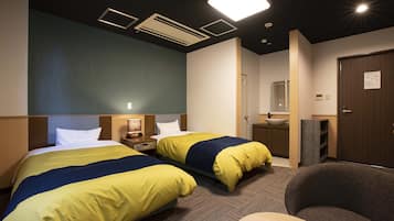 Twin Room, Non Smoking | In-room safe, individually furnished, iron/ironing board, free WiFi