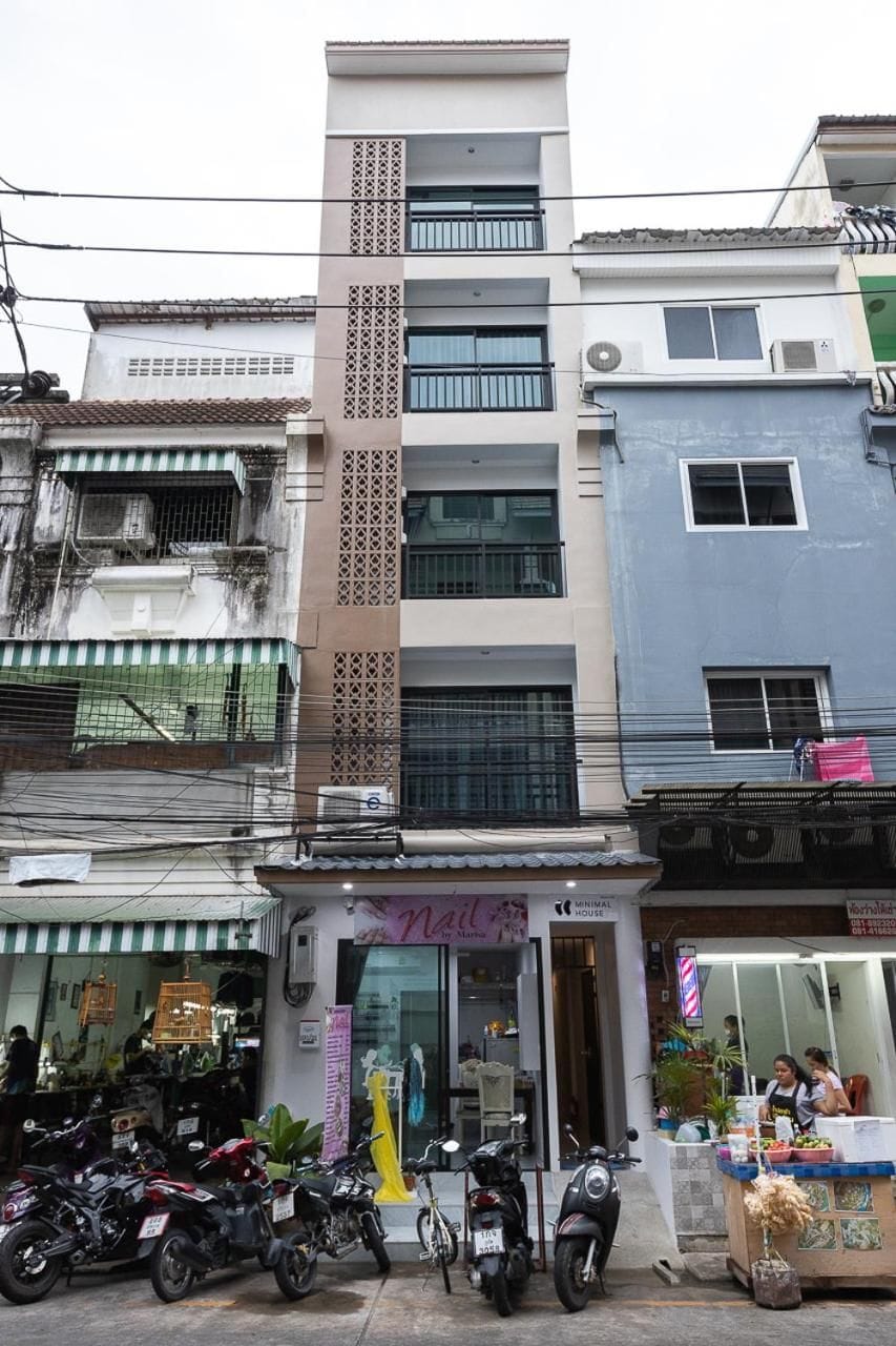 A multi-story building with a storefront at the ground level.