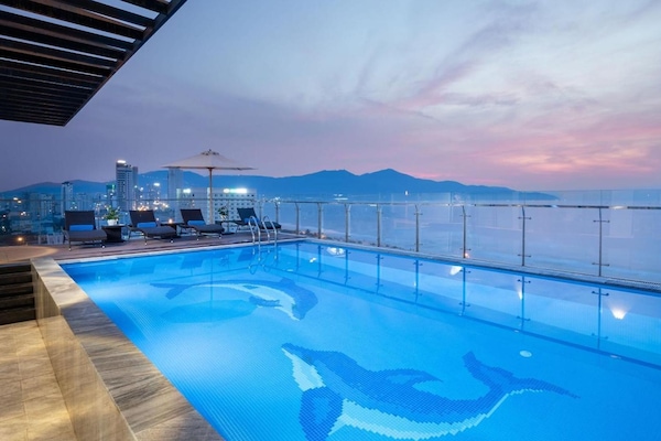 Outdoor pool, pool umbrellas, sun loungers