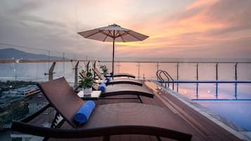 Outdoor pool, pool umbrellas, pool loungers