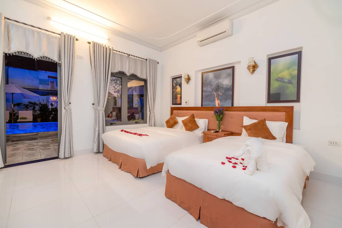 Deluxe Triple Room, Pool View | Egyptian cotton sheets, premium bedding, memory foam beds, minibar