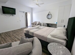 Standard Studio, 1 Queen Bed, Ground Floor (Budget Studio) | Desk, blackout drapes, soundproofing, iron/ironing board - Escape On Lake (Cairns)