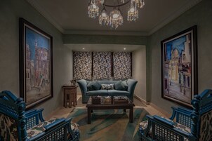 Superior King Suite with Balcony | Living area | 40-inch flat-screen TV with satellite channels, TV