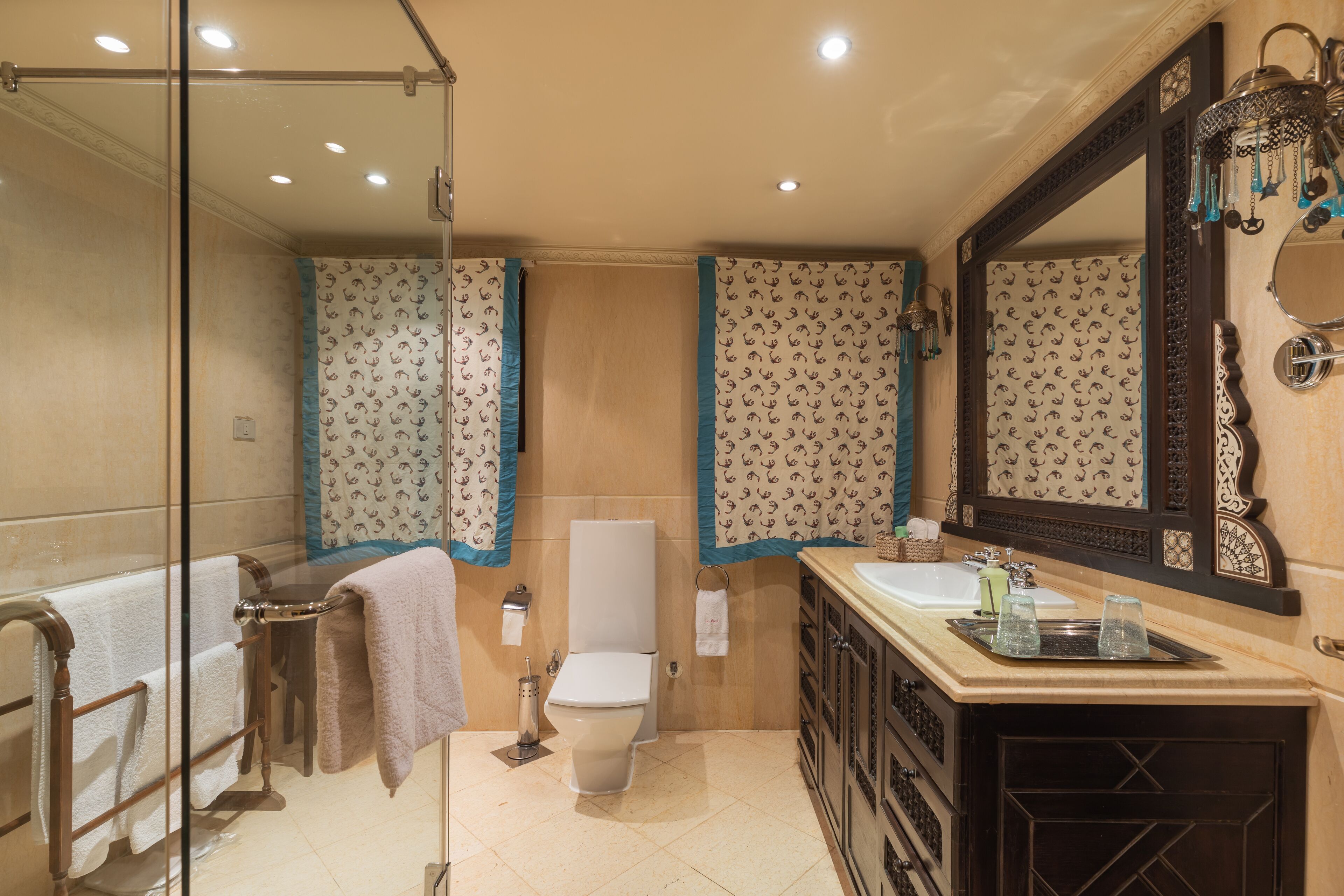 deluxe suite | bathroom | shower, free toiletries, hair dryer, bathrobes