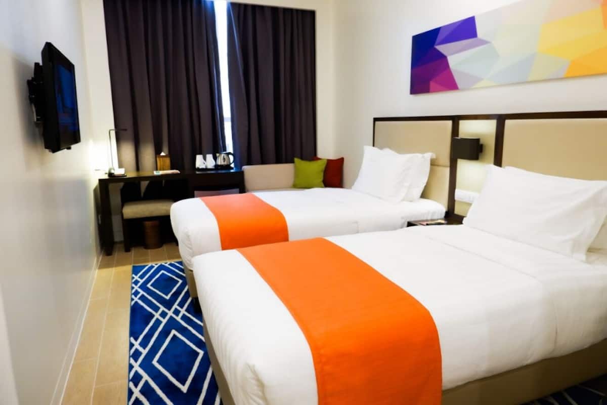 In-room safe, desk, iron/ironing board (on request), cots/infant beds