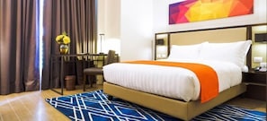 Chambre exécutive, 1 grand lit | Minibar, coffre-fort, bureau, fer et planche à repasser
