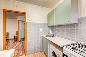 Apartamento | Cozinha privada | Geladeira, micro-ondas, fogão, cooktop