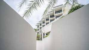 A modern building with a white facade and balconies. - Heaven View Krabi (Krabi)