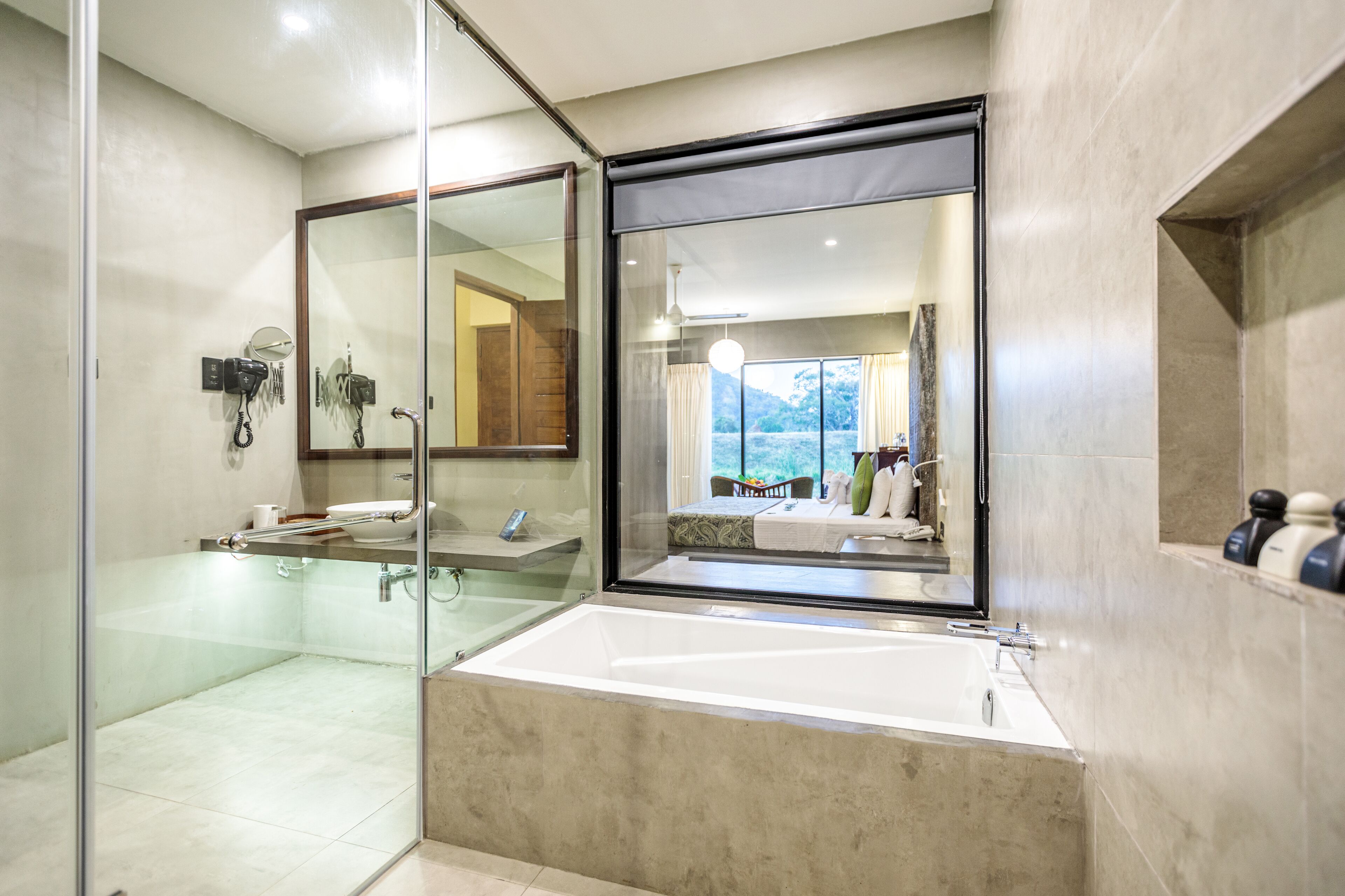 Separate tub and shower, rainfall showerhead, free toiletries