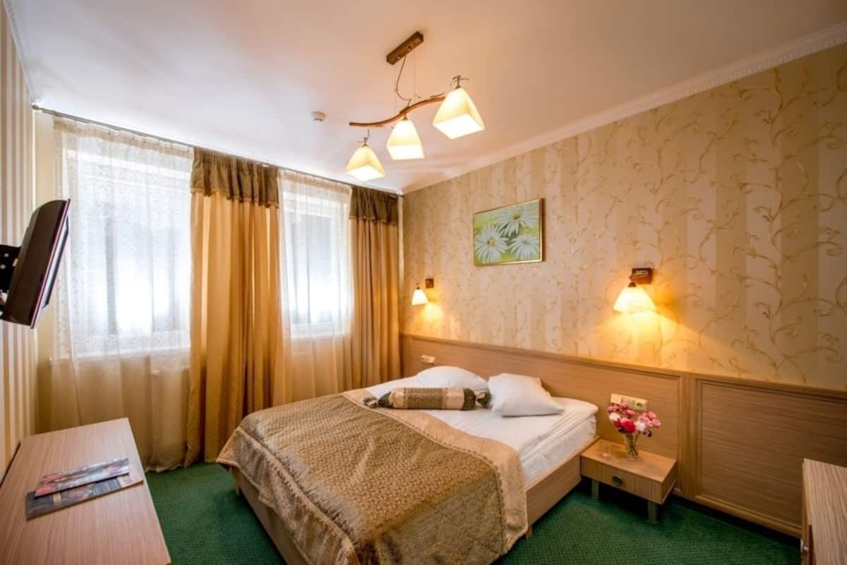 Quarto quádruplo família, 2 quartos | Frigobar, cofres nos quartos, cortinas blackout, quartos à prova de som