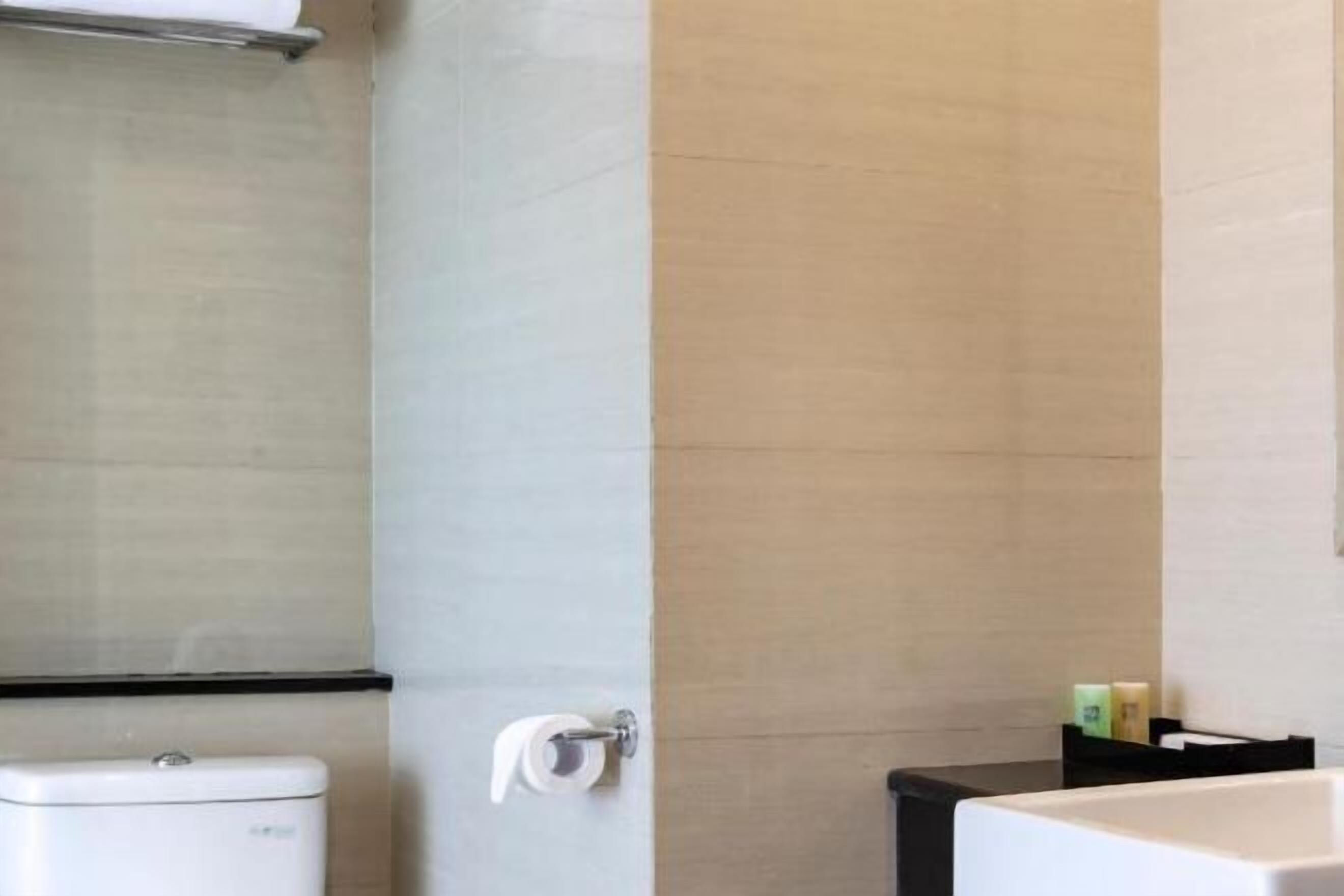 Shower, free toiletries, slippers, towels