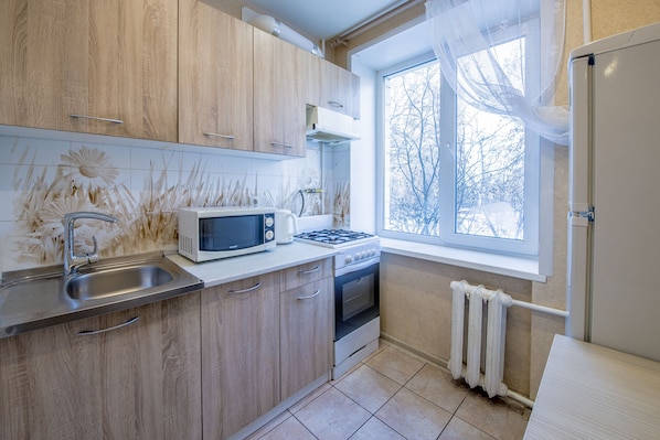 Apartment | Private kitchen | Full-sized fridge, microwave, oven, stovetop