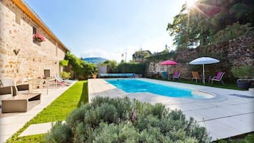 Seasonal outdoor pool, pool umbrellas, sun loungers