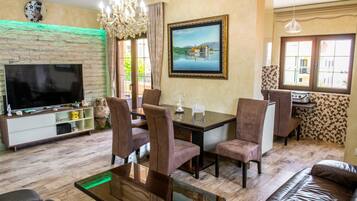 Deluxe Apartment, 3 Bedrooms, Sea View | Living area | LCD TV