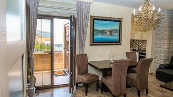 Deluxe Apartment, 3 Bedrooms, Sea View | Living area | LCD TV