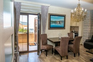 Deluxe Apartment, 3 Bedrooms, Sea View | Living area | LCD TV - Apartments R. (Tivat)