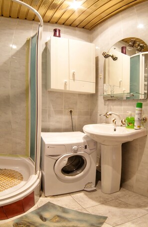 Standard Apartment, 1 King Bed with Sofa bed, Non Smoking | Bathroom | Combined shower/bathtub, free toiletries, hair dryer, slippers