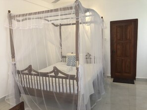 Chambre Double Deluxe, vue jardin (A/C) | Coffres-forts dans les chambres, bureau, chambres insonorisées