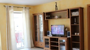 Familieleilighet, balkong | Oppholdsrom | Flatskjerm-TV