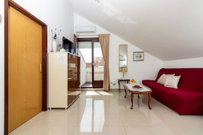Apartment, 1 Bedroom | Living area | Flat-screen TV - Apartments Song (Split)