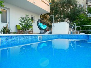 Seasonal outdoor pool, open 9:00 AM to 8:00 PM, pool umbrellas - Apartments Song (Split)