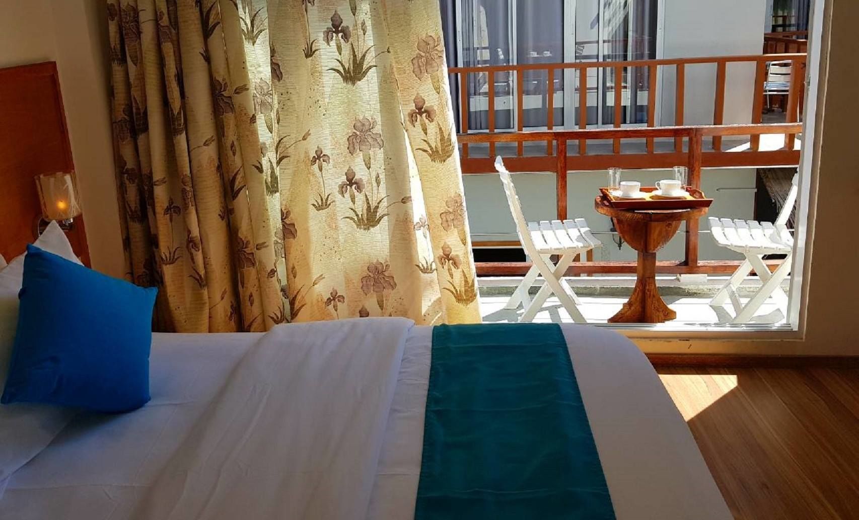 deluxe double room, balcony, city view | view from room