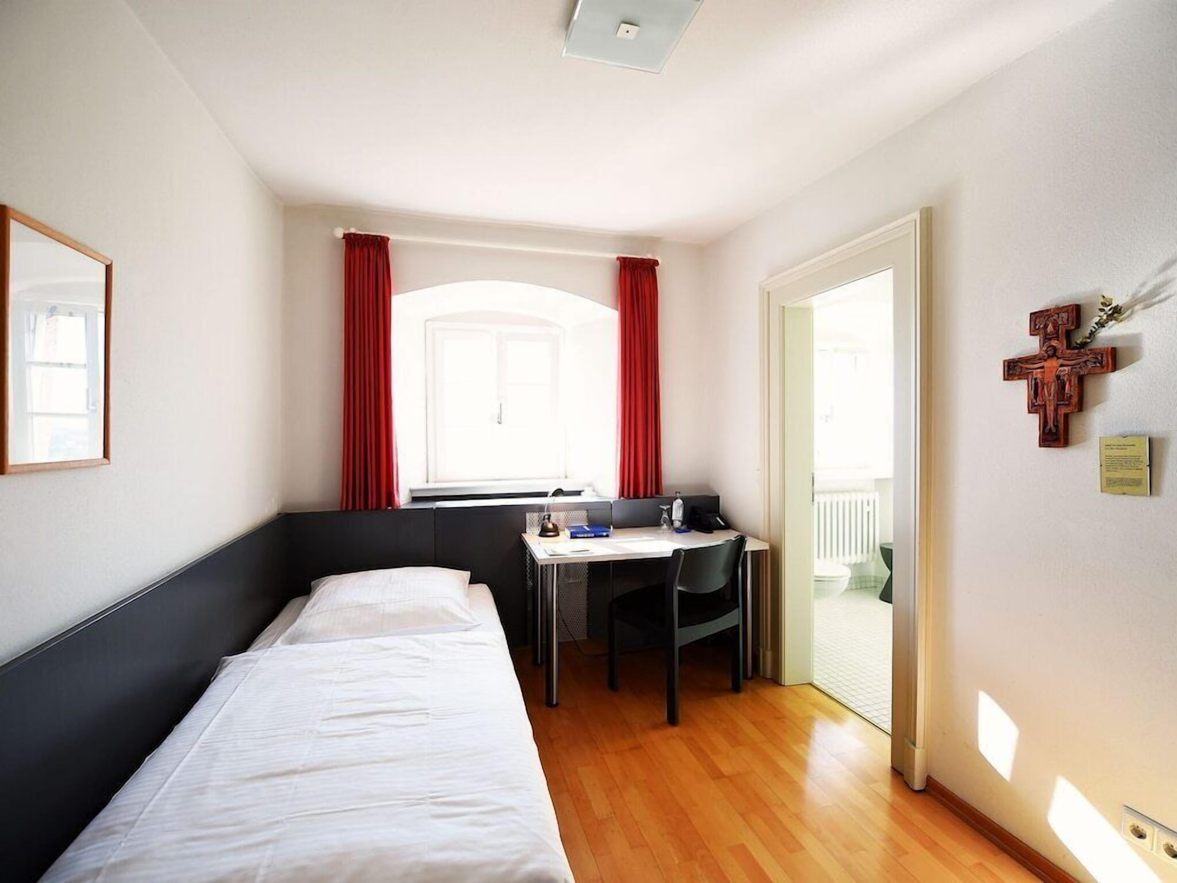 Individually furnished, desk, laptop workspace, blackout drapes