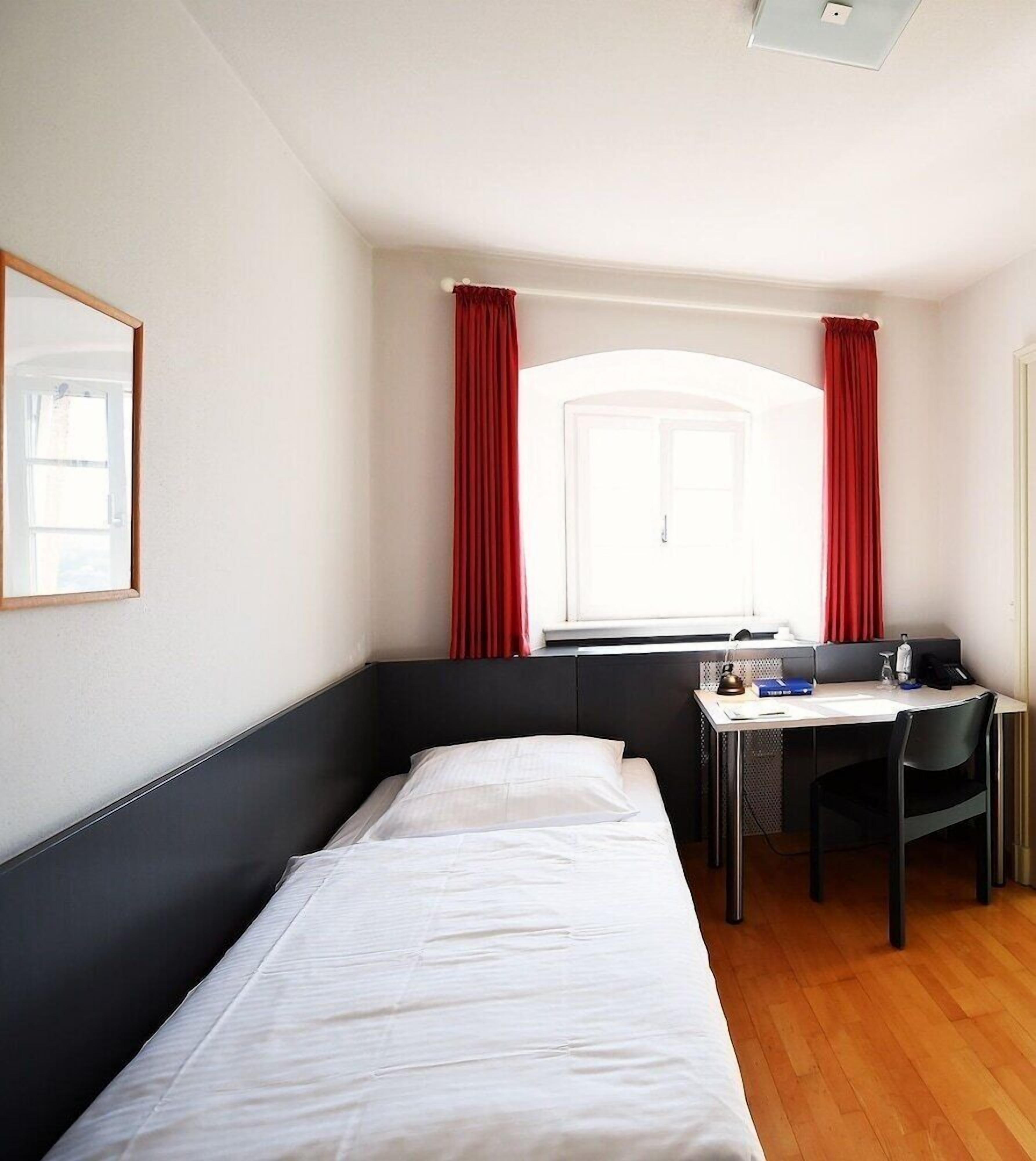 Individually furnished, desk, laptop workspace, blackout drapes