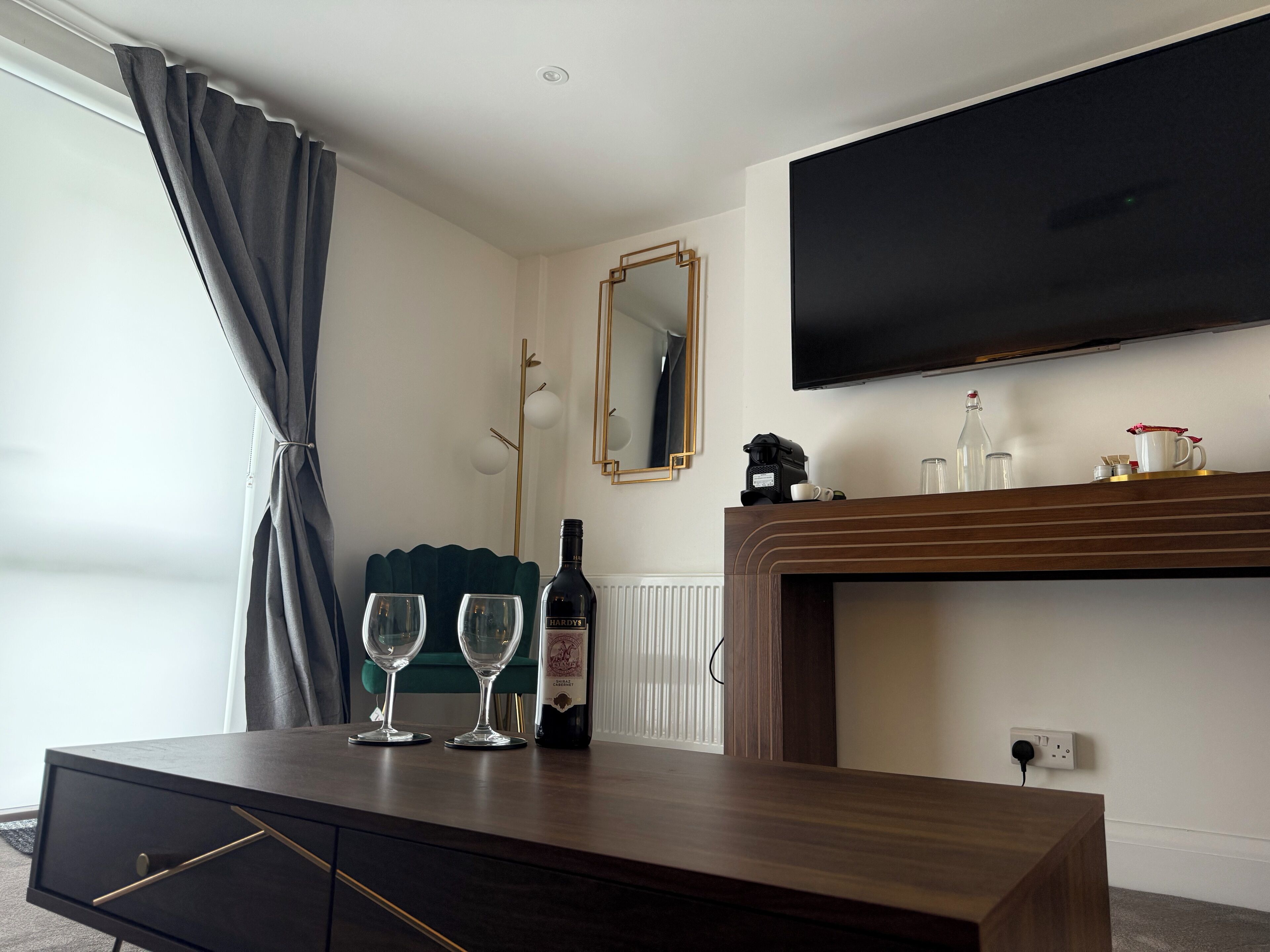 luxury studio suite | living area | 55-inch smart tv with digital channels