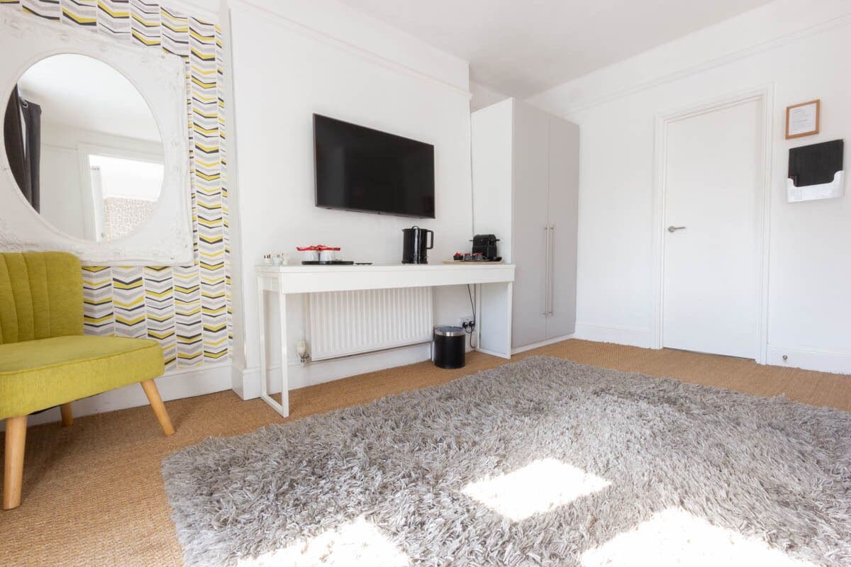 luxury superking suite, balcony | living area | 55-inch smart tv with digital channels