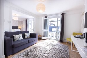 Luxury Superking Suite, Balcony | Living area | 55-inch Smart TV with digital channels