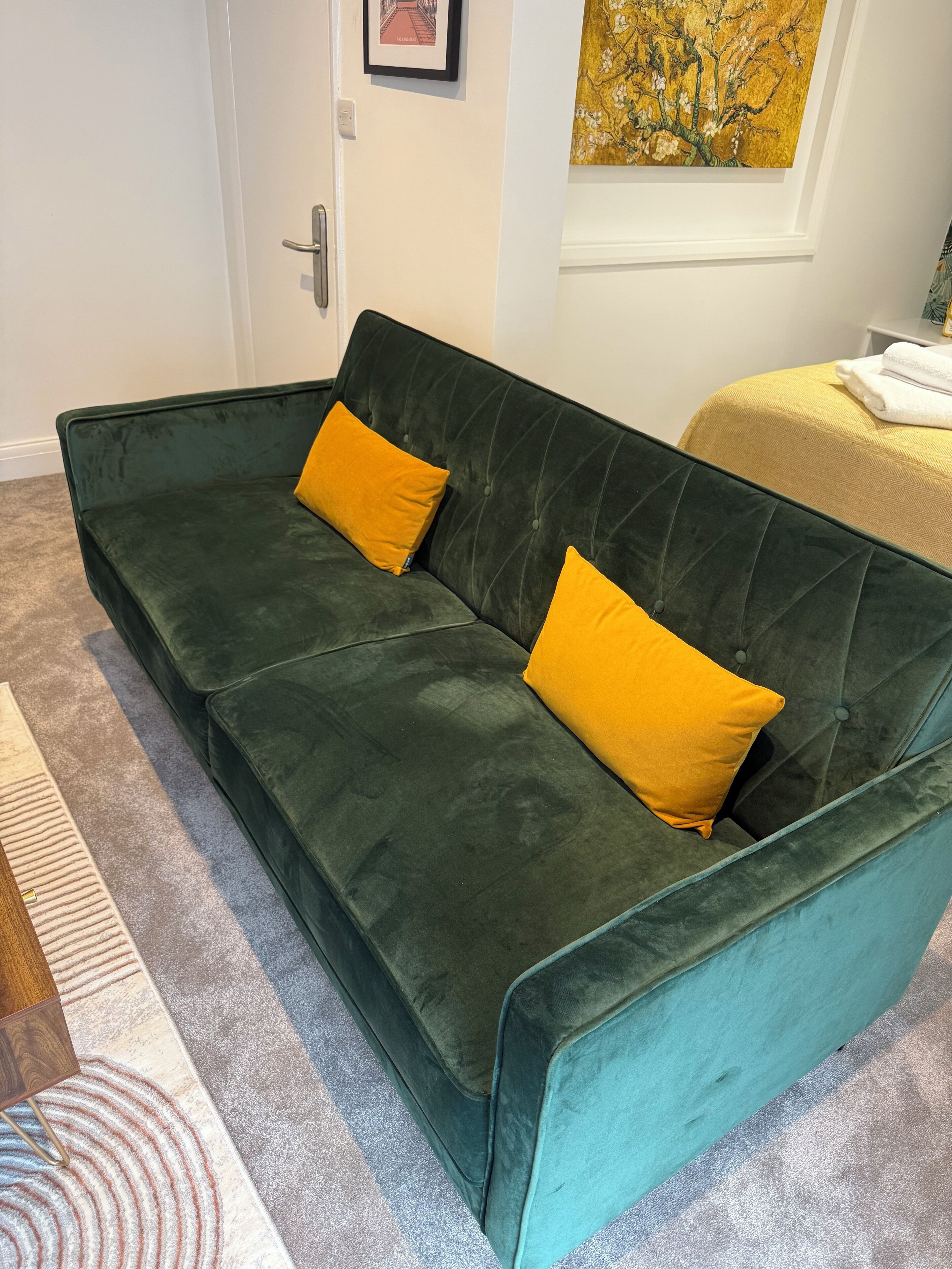 luxury studio suite | living area | 55-inch smart tv with digital channels