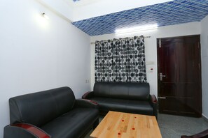 Habitación con 1 cama matrimonial o 2 individuales | Sala de estar