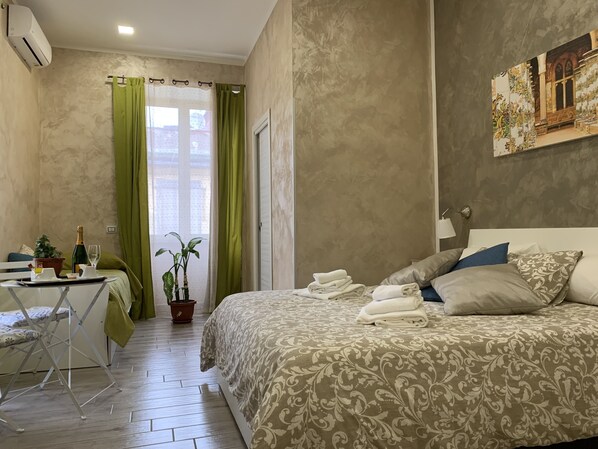 Family Suite, Balcony | In-room safe, desk, blackout drapes, soundproofing - Joy Naples (Naples)
