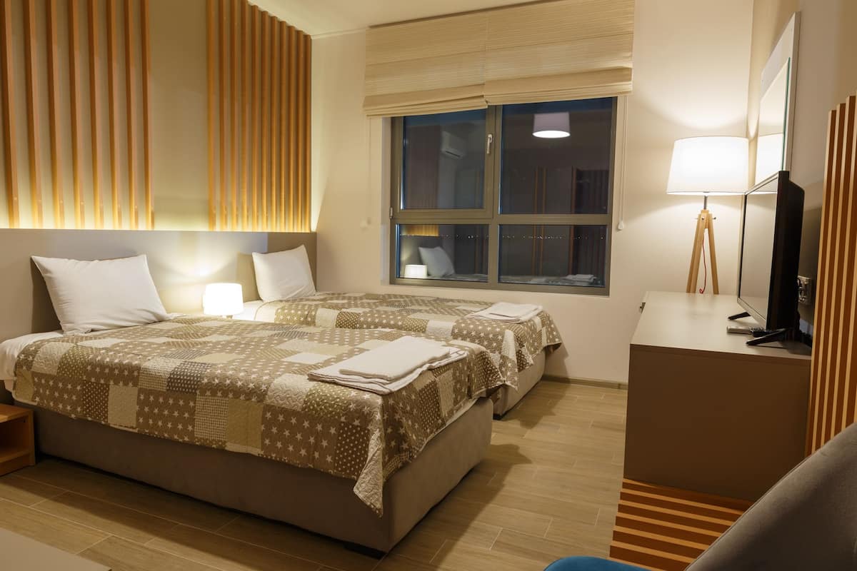 Blackout drapes, soundproofing, WiFi (free), bed sheets