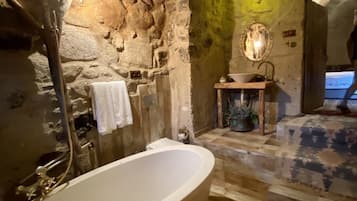 Superior Room | Bathroom | Bathtub, deep soaking tub, hair dryer, slippers