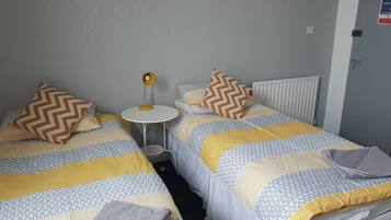 Basic Twin Room, Shared Bathroom | Iron/ironing board, free WiFi, bed sheets